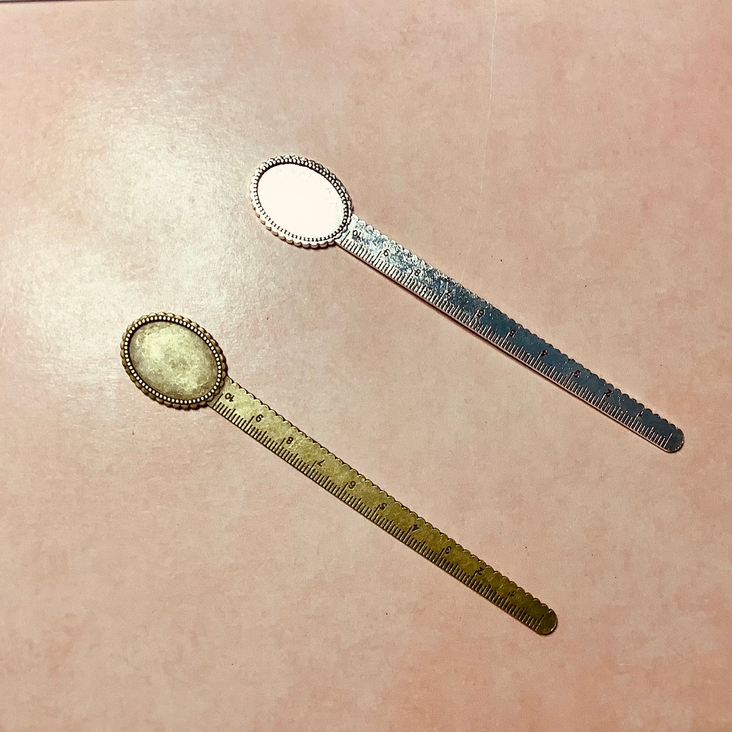 Metal bookmark with cabochon inset and ruler