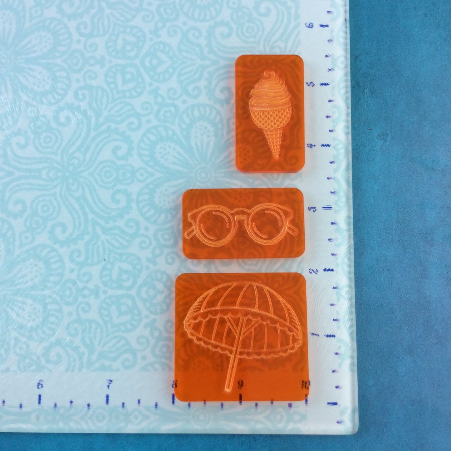 Summer Time Deco Disc stamps texture and stamp animal print designs in polymer clay