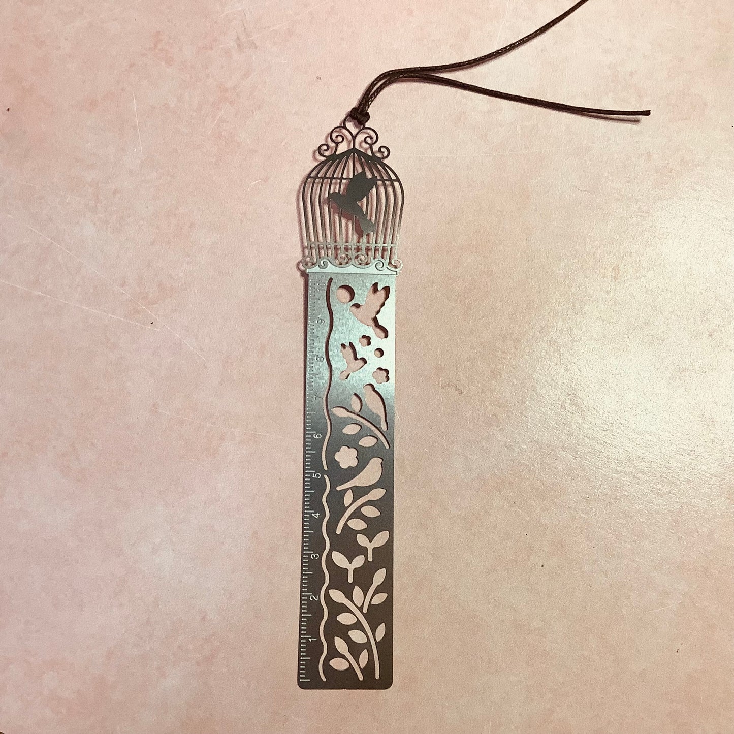 Birdcage ruler, embossed metal bookmark