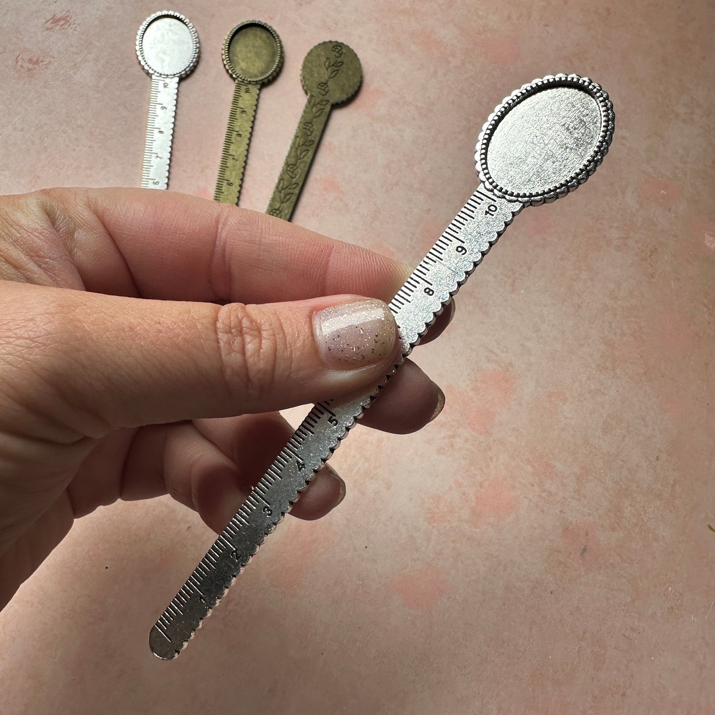 Metal bookmark with cabochon inset and ruler
