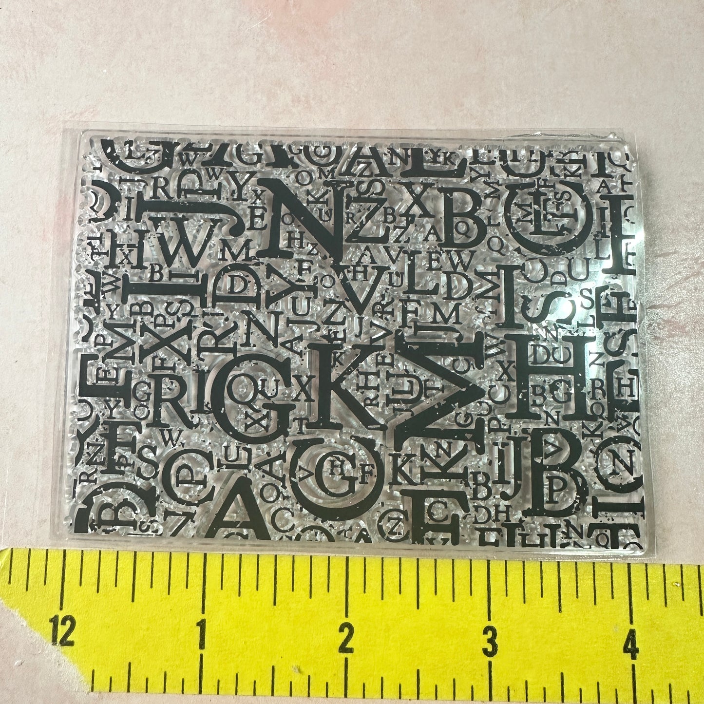 Letters grunge background clear clay and paper rubber stamp