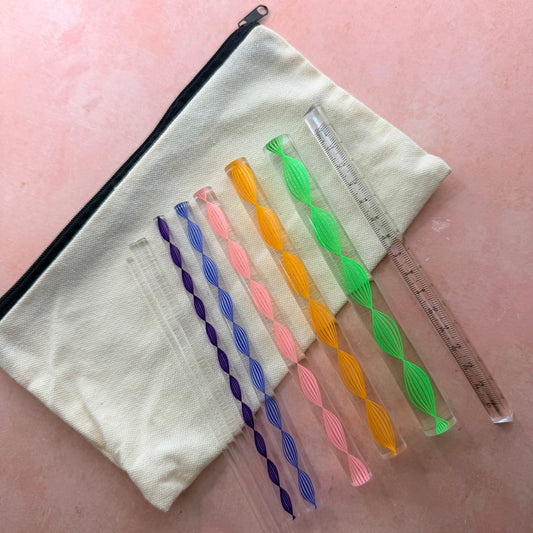 Dotting and Pressing Set 9 piece acrylic rod set for polymer clay in zip canvas pouch showing colorful spiral inlay rods