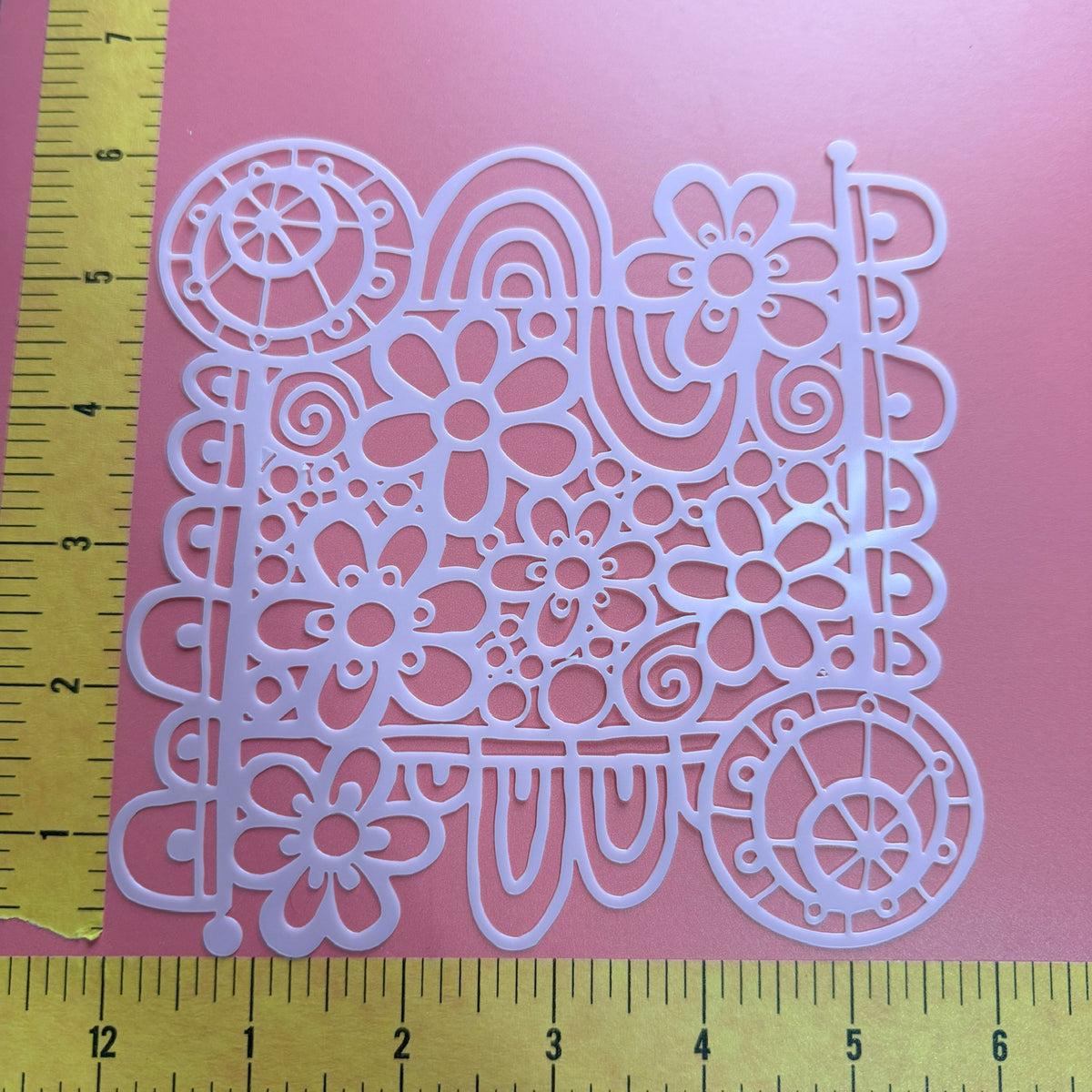 Wildflower Wheel Mylar stencil 6 inch full square showing dense retro floral and wheel medallion pattern
