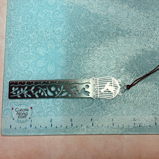 Birdcage ruler, embossed metal bookmark