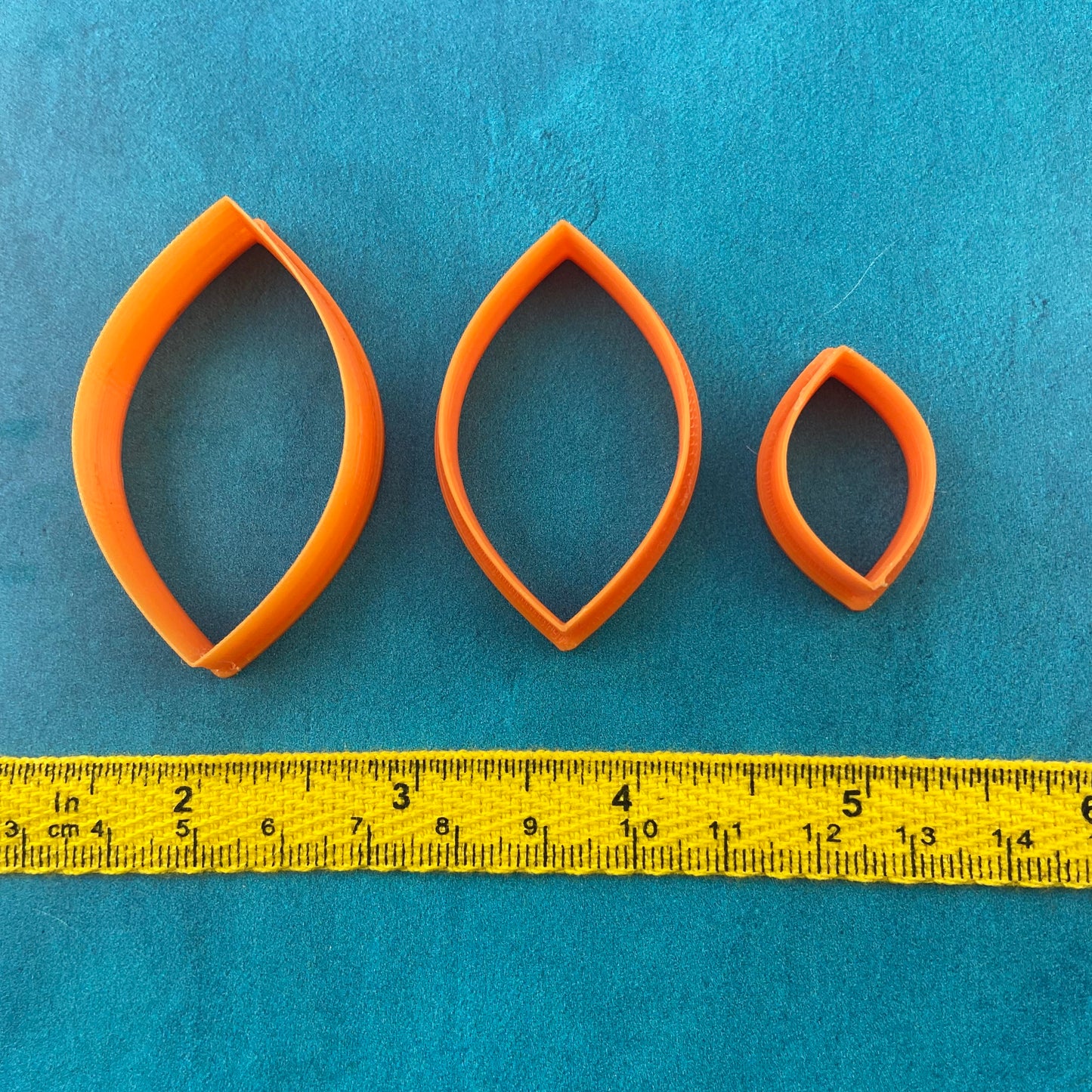 Curvaceous football shaped set of 3  polymer clay cutter set jewelry earrings pendant small sharp clay cutters